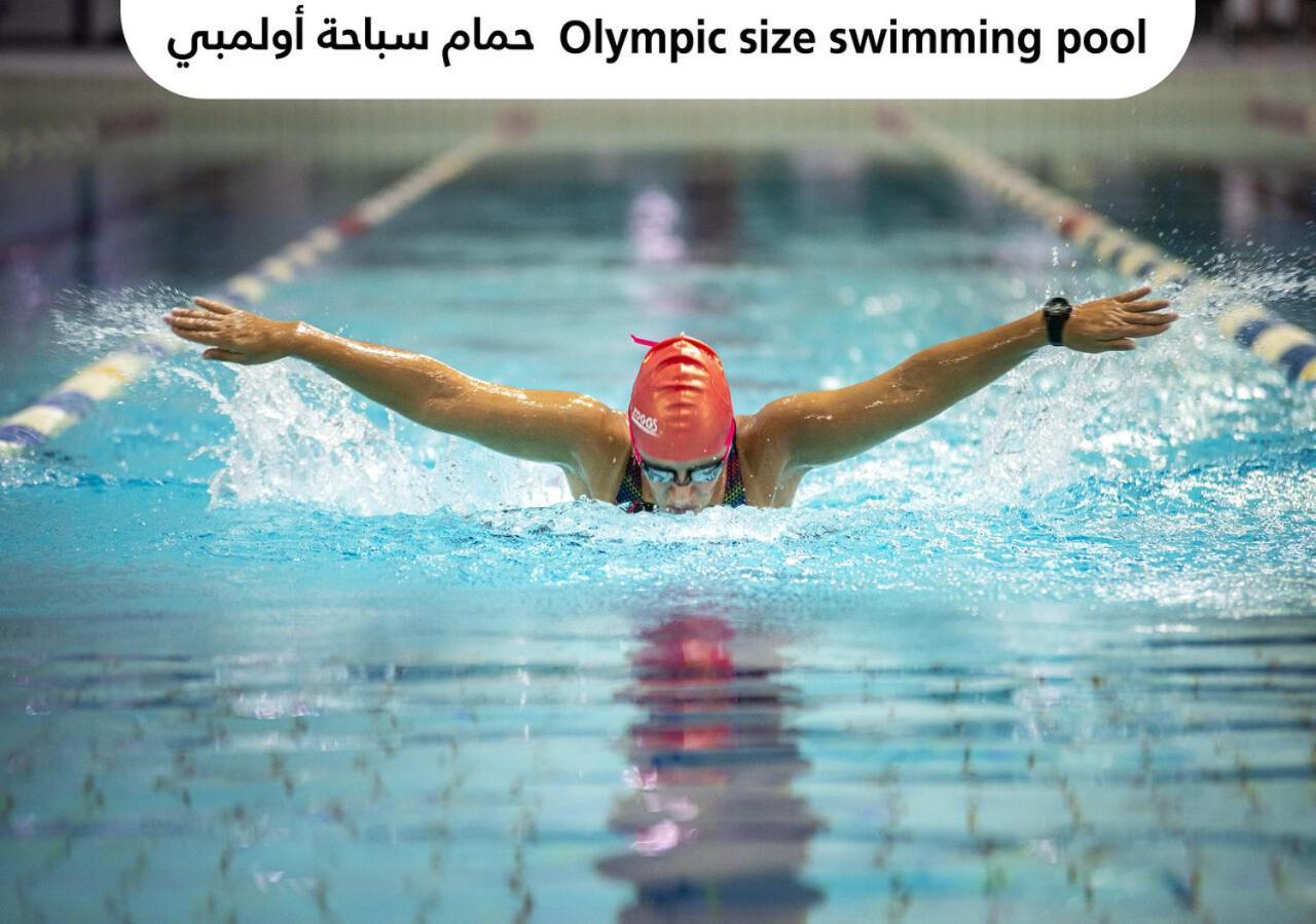 Officers Club & Hotel Abu Dhabi Eksteriør bilde Olympic size swimming pool