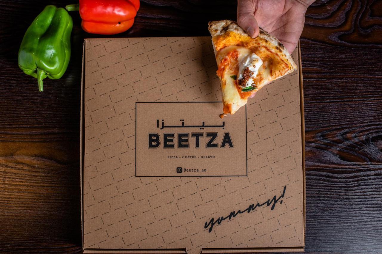Officers Club & Hotel Abu Dhabi Eksteriør bilde Beetza pizza